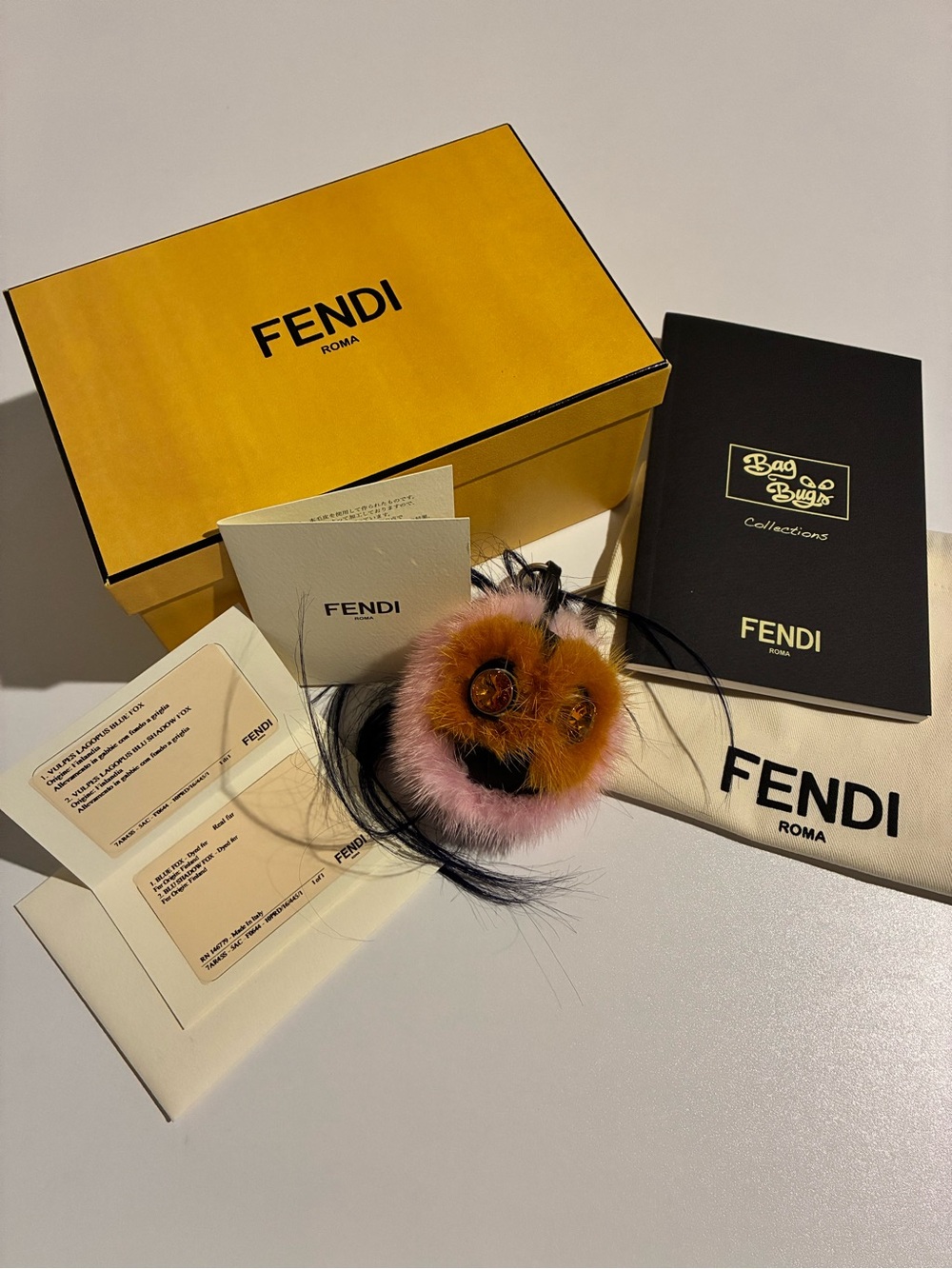 Fendi Marshmellow Pink and Orange Fur Bags Bug Charm